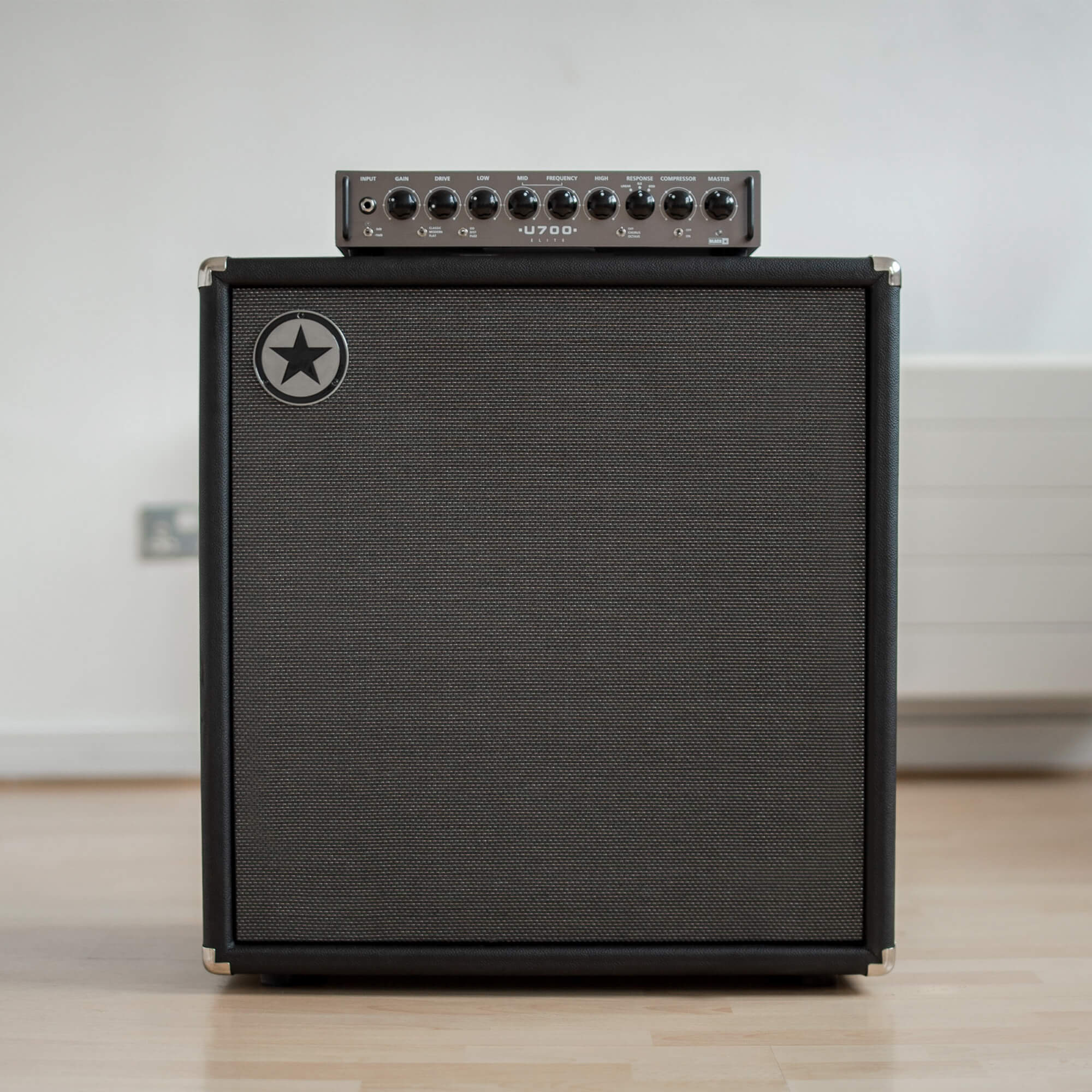 Blackstar Amps Unity Pro Bass System Elite 700 Head on top of cab