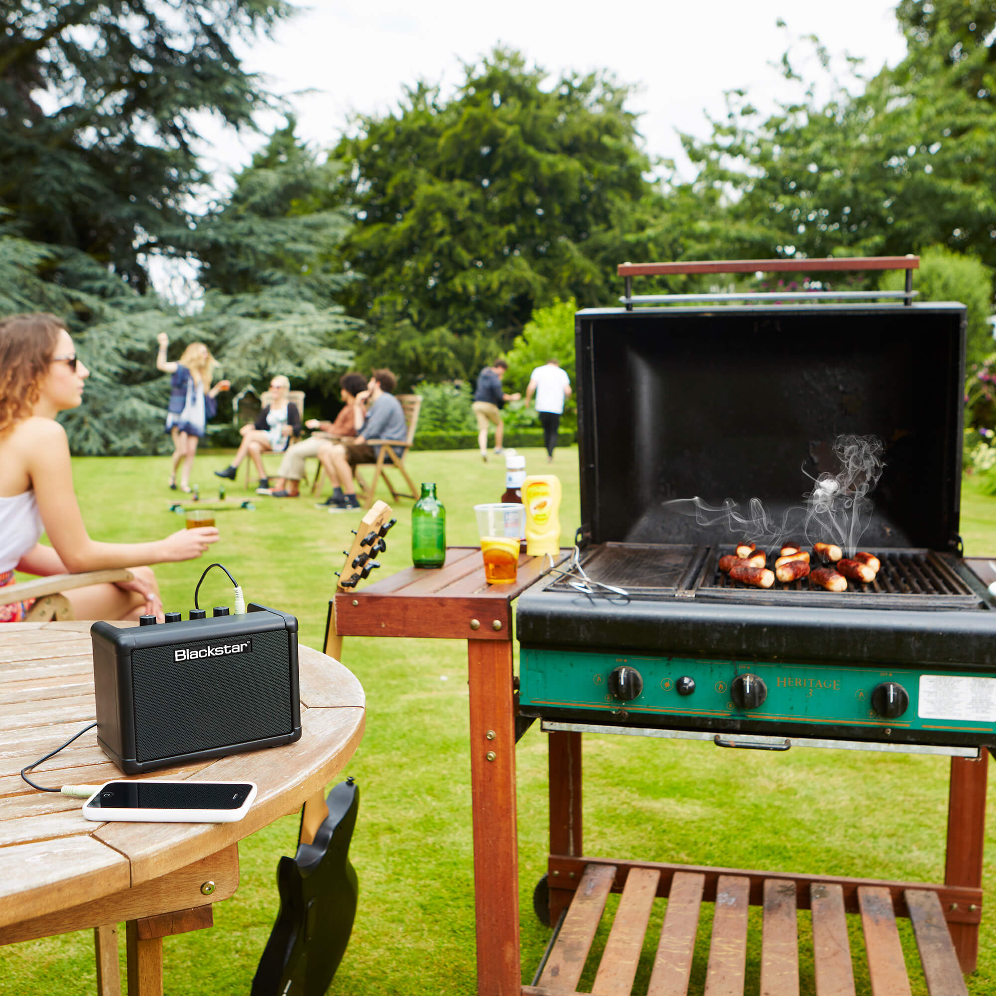 Blackstar Amps FLY 3 mini guitar amplifier outdoors at a BBQ