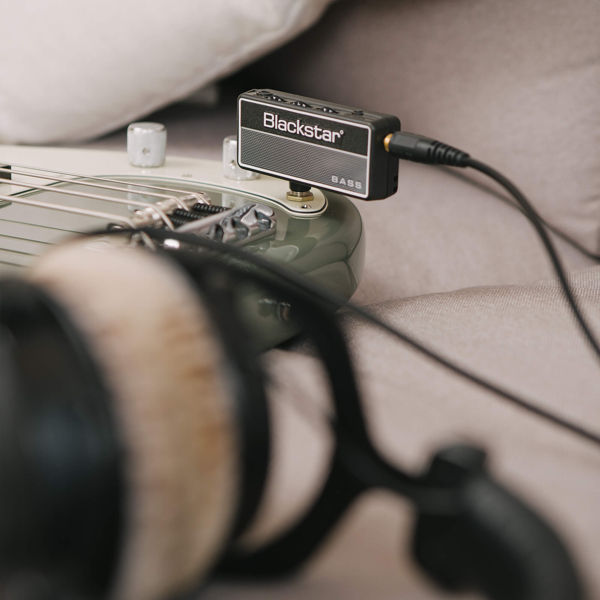 Blackstar amplug 2 FLY Bass amp plugged into electric bass and headphones