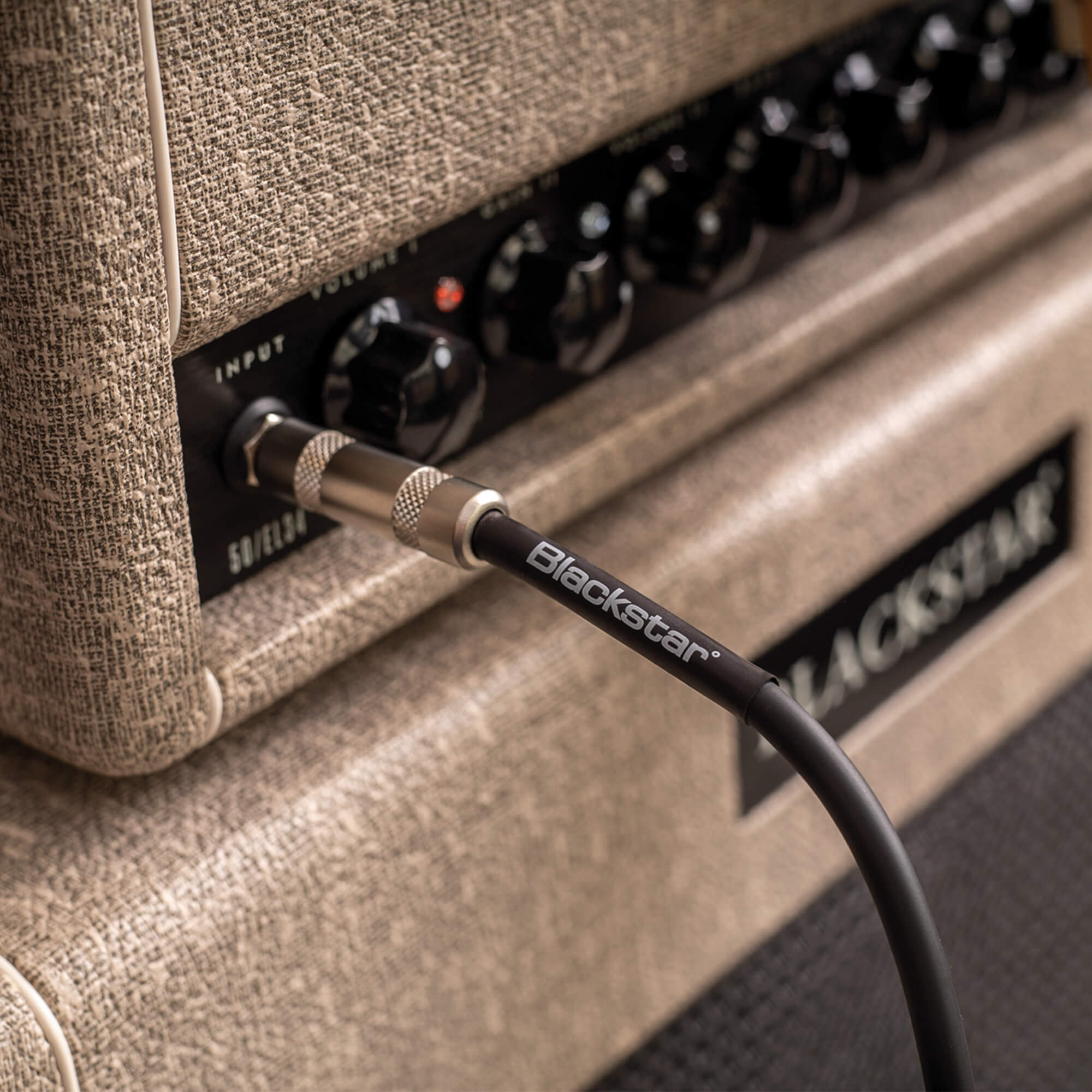 Blackstar instrument cable plugged into an amplifier