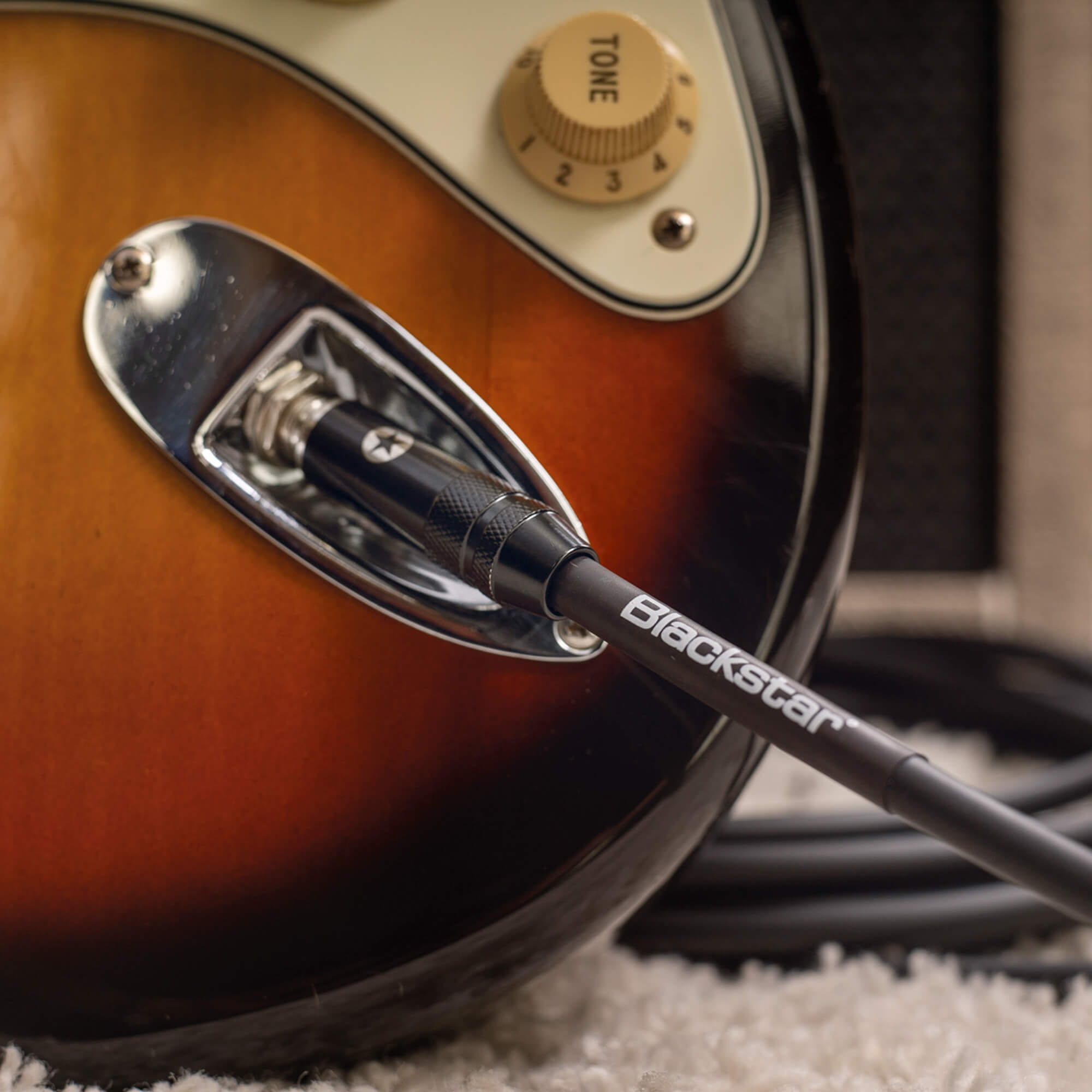 Blackstar instrument cable plugged into guitar